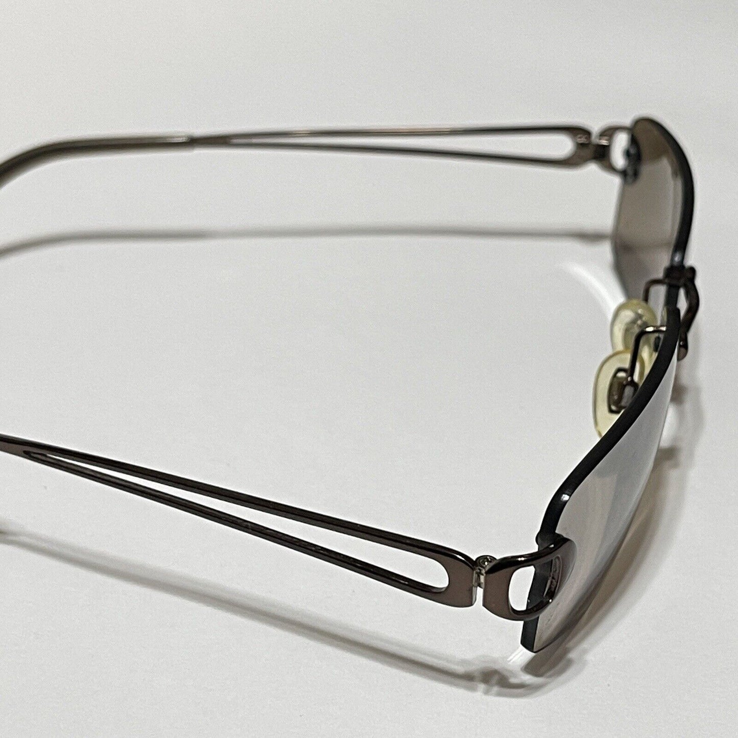 Nine & Co Rimless Sunglasses Bronze Metal Brown Lenses Rectangle