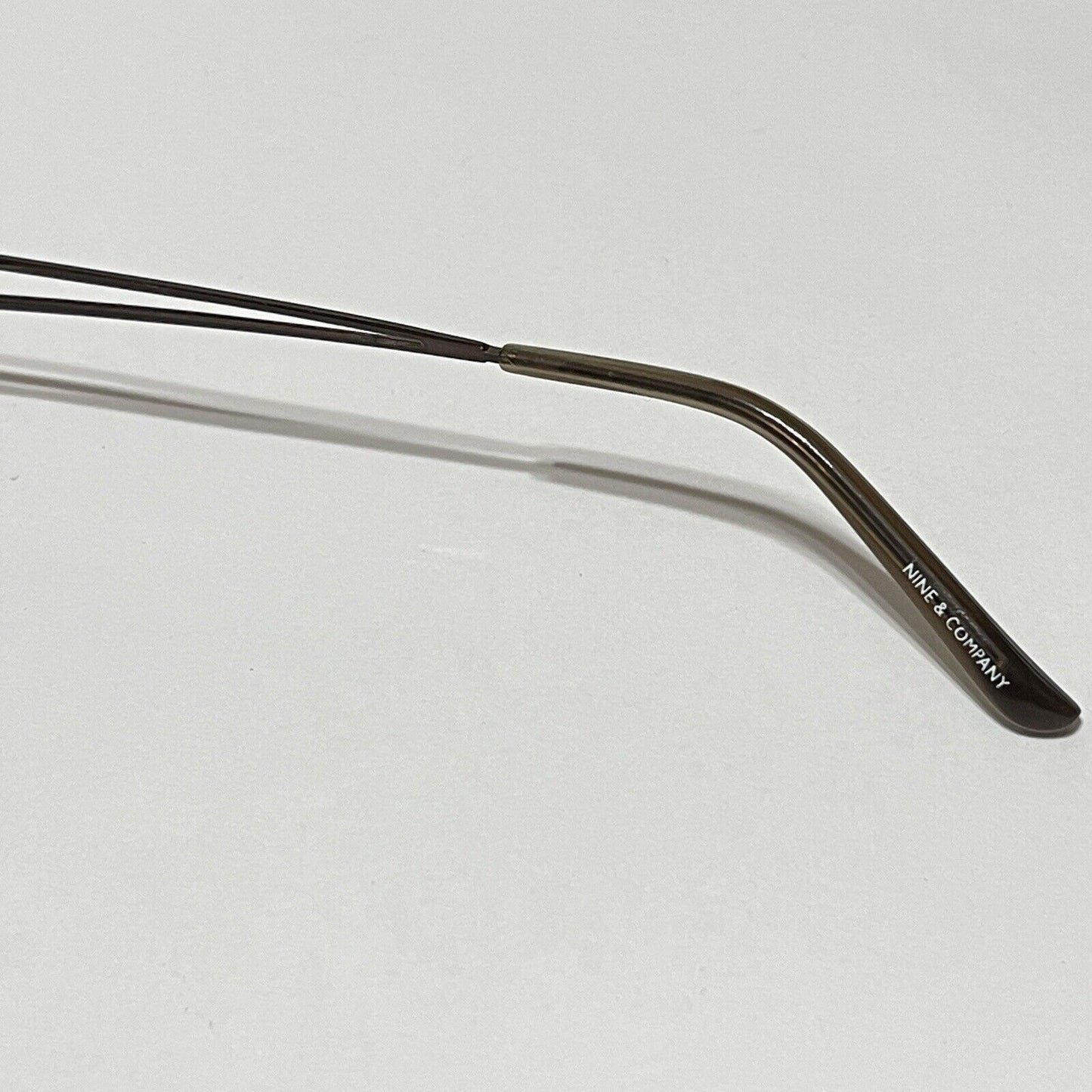 Nine & Co Rimless Sunglasses Bronze Metal Brown Lenses Rectangle