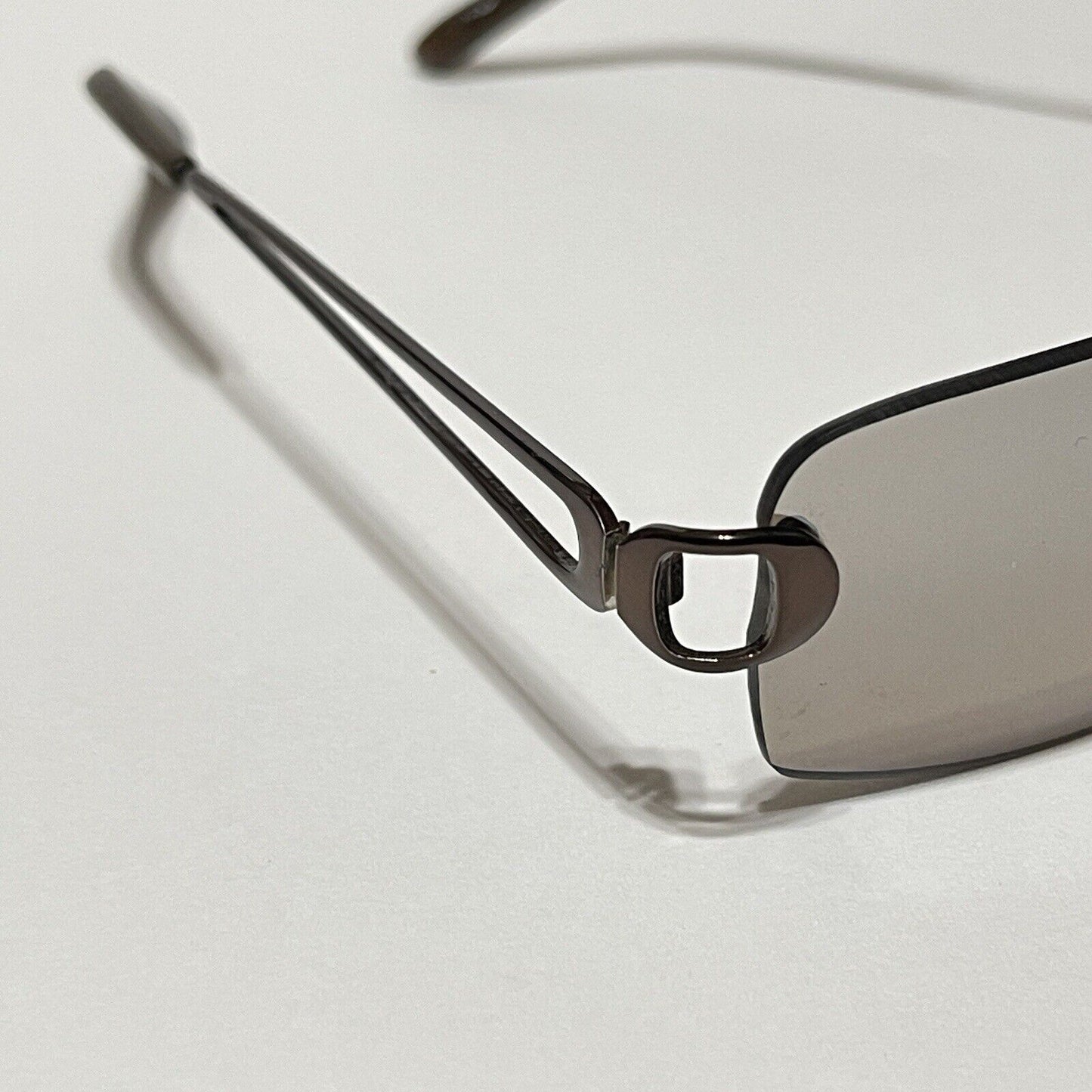 Nine & Co Rimless Sunglasses Bronze Metal Brown Lenses Rectangle