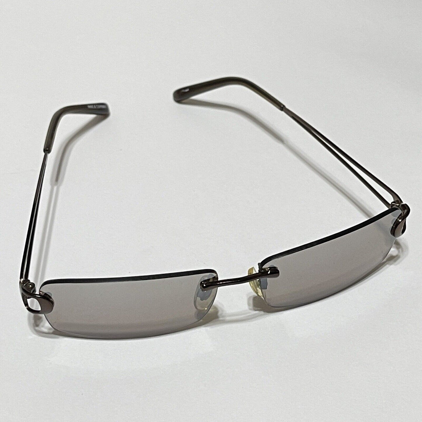 Nine & Co Rimless Sunglasses Bronze Metal Brown Lenses Rectangle