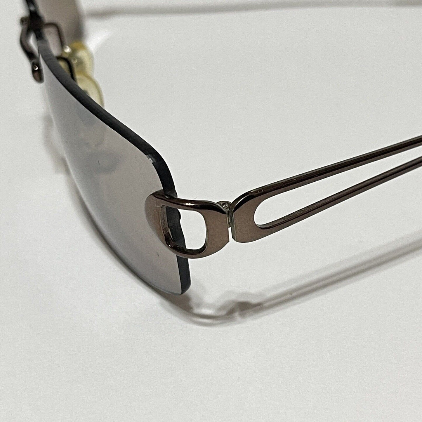Nine & Co Rimless Sunglasses Bronze Metal Brown Lenses Rectangle